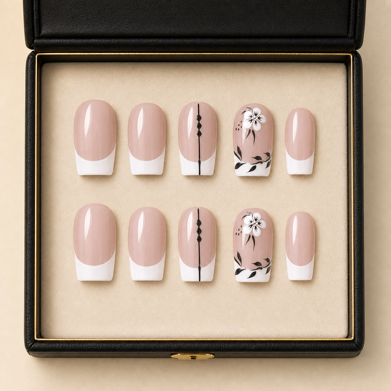 Secret Garden press-on nails in the LPL black presentation case